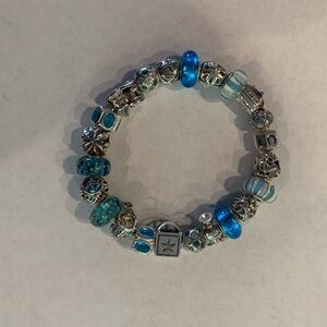 Chamilia 8 inch Silver charm bracelet with 22 charms